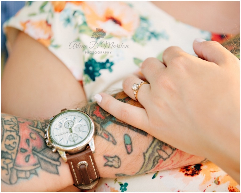 Tattoo Sleeve showcasing engagement ring