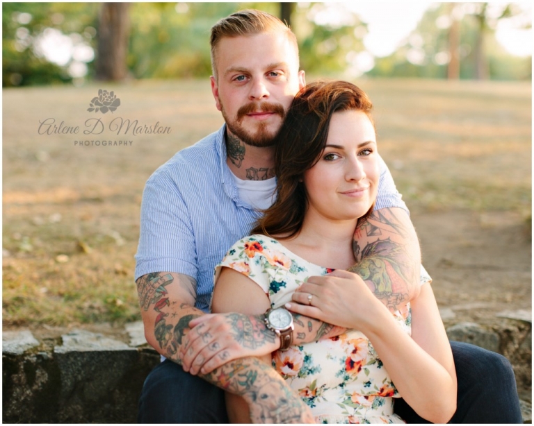 Tattoo Artist and Hair Stylist pose for engagement pictures at Salem Willows