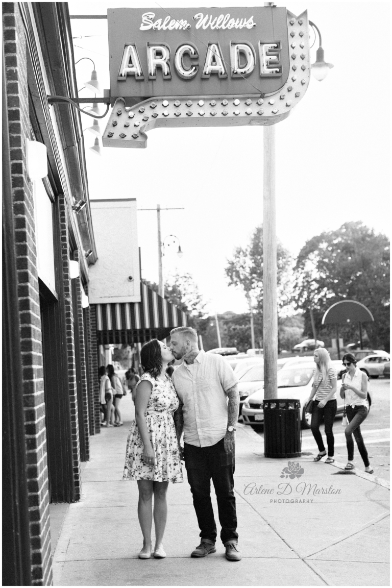 Couple kissing at Salem Willows arcade