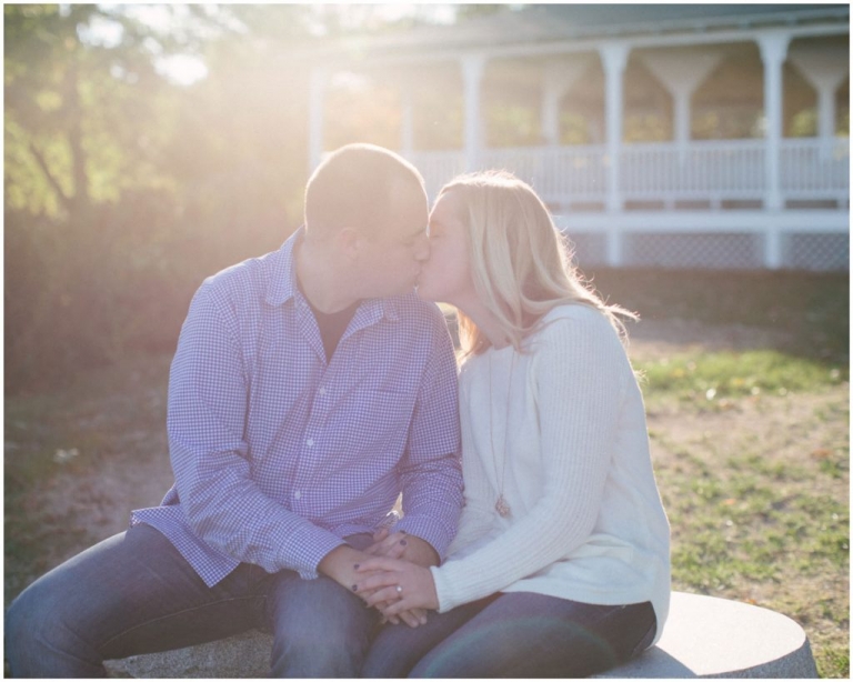 Engaged Couple kisses at Tuck's Point Manchester-by-the-Sea by North Shore Wedding photographer Arlene D Marston